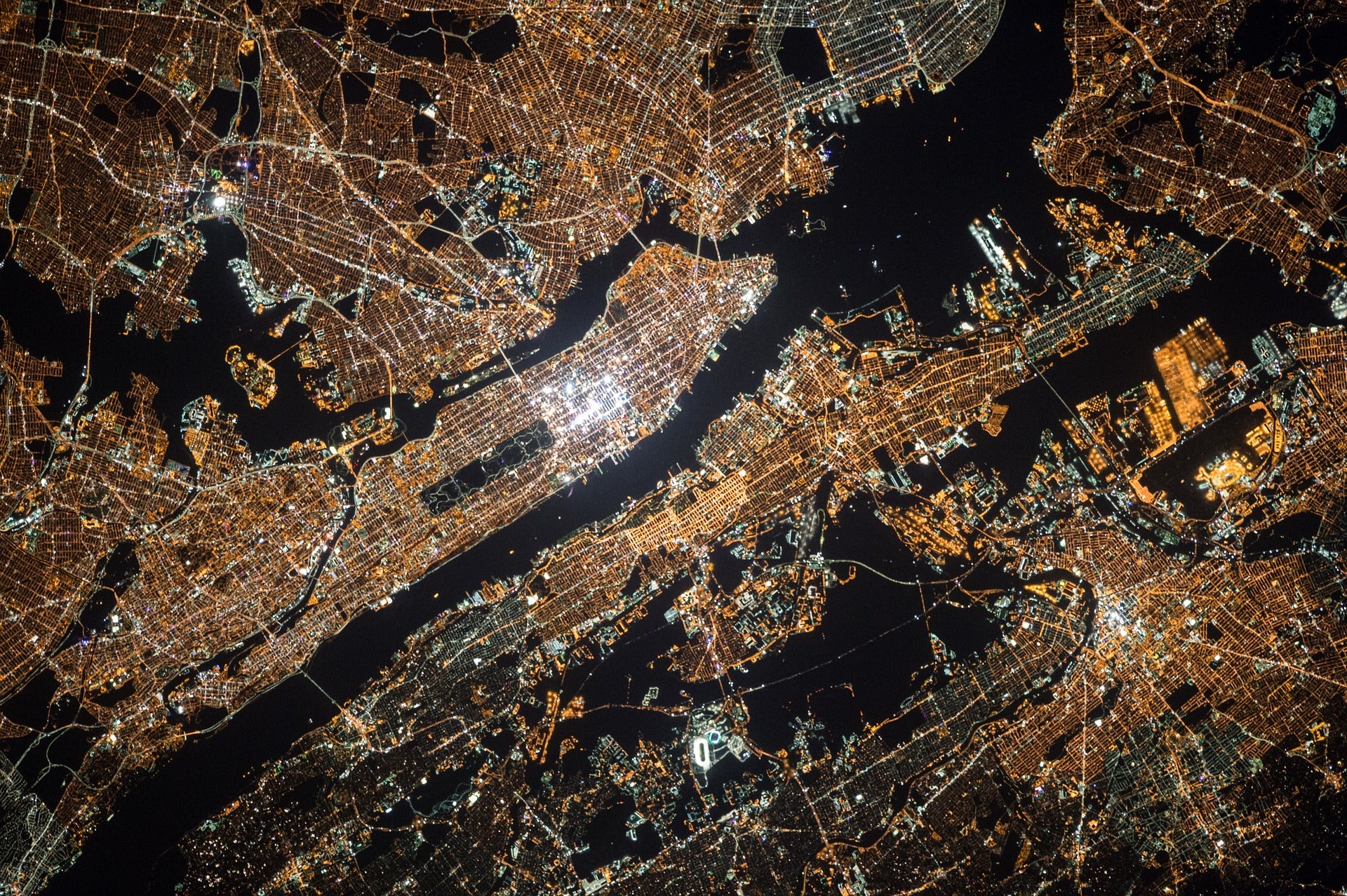 An aerial view of New York City at night.